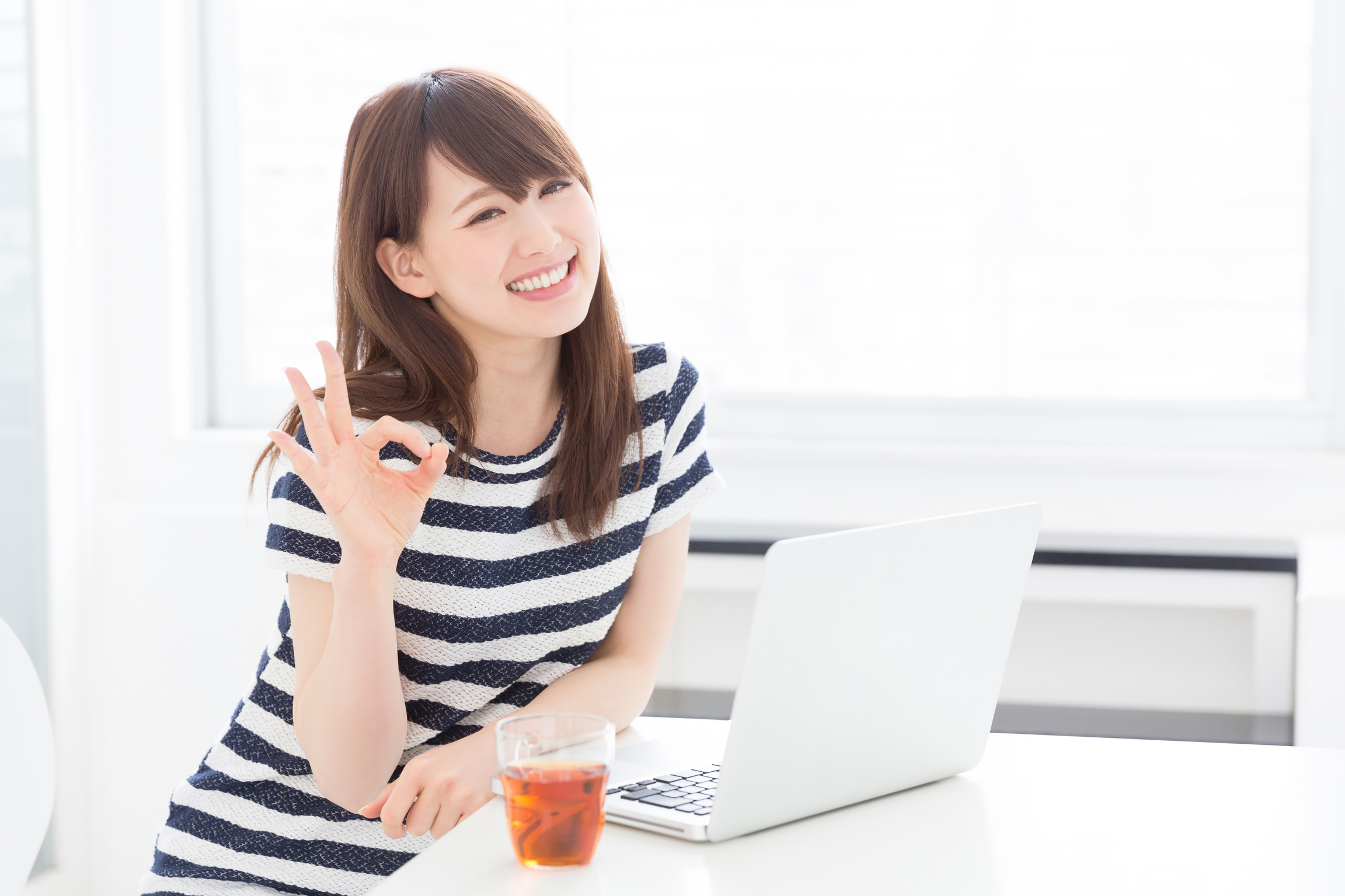 Japanese woman using a PC